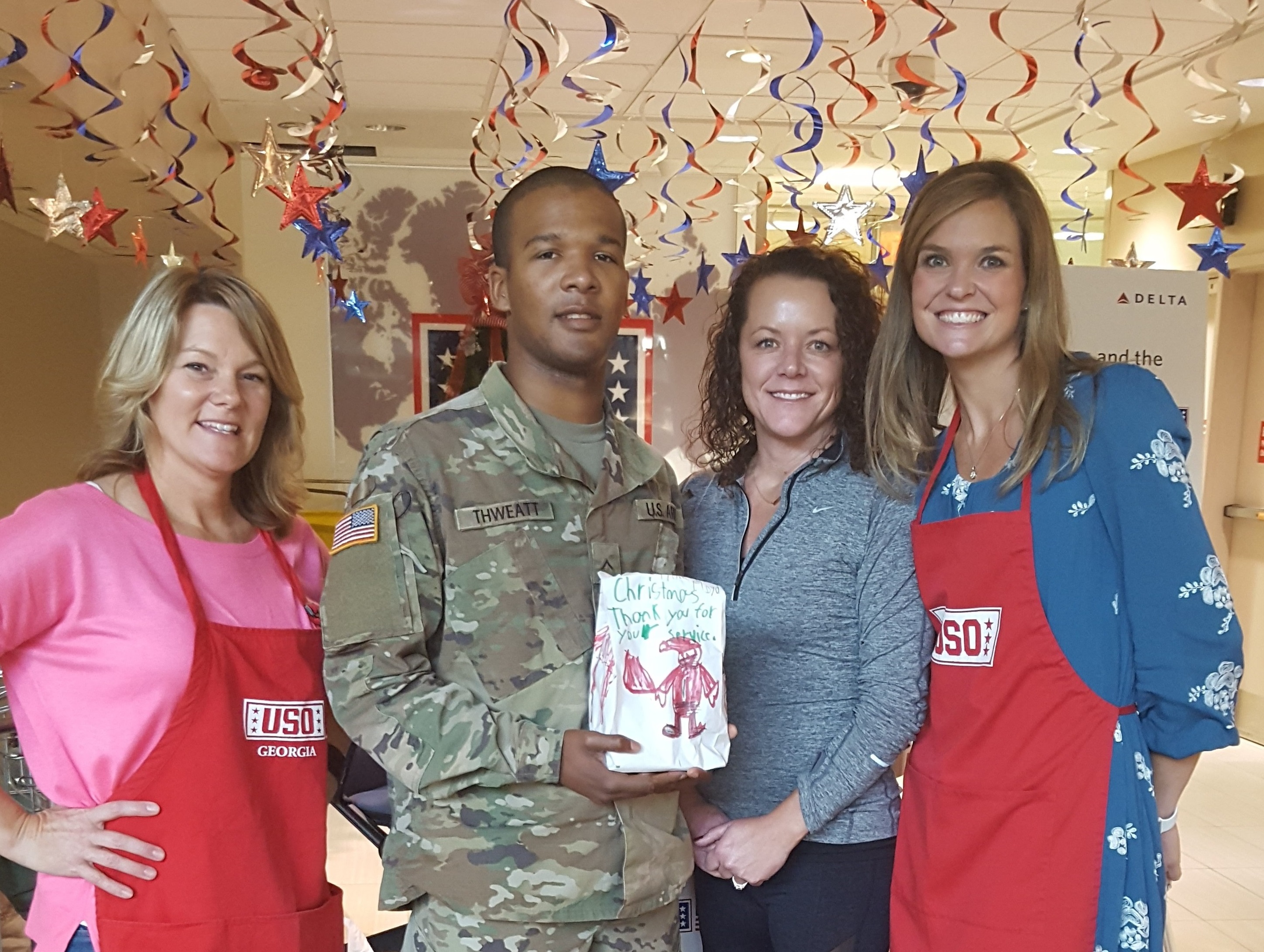 Coming home for the holidays, soldiers enjoy USO Center